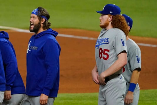 Los Angeles Dodgers starting pitcher Clayton Kershaw celebrates their win against the Tampa Bay Rays in Game 5 of the baseball World Series Sunday, Oct. 25, 2020, in Arlington, Texas. Dodgers beat the Rays 4-2 to lead the series 3-2 games. (AP Photo/Tony Gutierrez) Los Angeles Dodgers starting pitcher Clayton Kershaw celebrates their win against the Tampa Bay Rays in Game 5 of the baseball World Series Sunday, Oct. 25, 2020, in Arlington, Texas. Dodgers beat the Rays 4-2 to lead the series 3-2 games. (AP Photo/Tony Gutierrez)