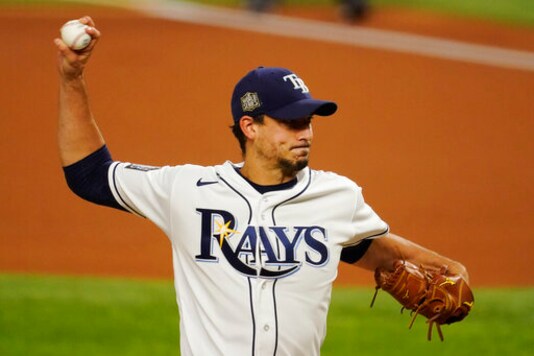 Tampa Bay Rays starting pitcher Charlie Morton throws against the Los Angeles Dodgers during the first inning in Game 3 of the baseball World Series Friday, Oct. 23, 2020, in Arlington, Texas. (AP Photo/Tony Gutierrez)