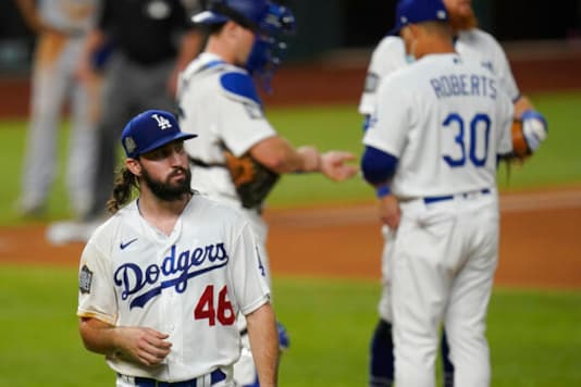 Los Angeles Dodgers starting pitcher Tony Gonsolin leaves the game against the Tampa Bay Rays during the second inning in Game 2 of the baseball World Series Wednesday, Oct. 21, 2020, in Arlington, Texas. (AP Photo/Eric Gay) Los Angeles Dodgers starting pitcher Tony Gonsolin leaves the game against the Tampa Bay Rays during the second inning in Game 2 of the baseball World Series Wednesday, Oct. 21, 2020, in Arlington, Texas. (AP Photo/Eric Gay)