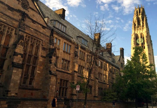 FILE - This Sept. 9, 2016 photo shows Harkness Tower on the campus of Yale University in New Haven, Conn. A Justice Department investigation has found Yale University is illegally discriminating against Asian-American and white applications, in violation of federal civil rights law, officials said Thursday, Aug. 13, 2020. (AP Photo/Beth J. Harpaz, File) FILE - This Sept. 9, 2016 photo shows Harkness Tower on the campus of Yale University in New Haven, Conn. A Justice Department investigation has found Yale University is illegally discriminating against Asian-American and white applications, in violation of federal civil rights law, officials said Thursday, Aug. 13, 2020. (AP Photo/Beth J. Harpaz, File)