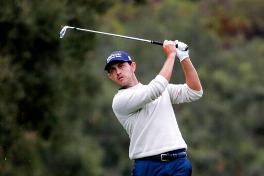 Patrick Cantlay watches his shot from the 18th fairway during the final round of the Zozo Championship golf tournament Sunday, Oct. 25, 2020, in Thousand Oaks, Calif. (AP Photo/Ringo H.W. Chiu) Patrick Cantlay watches his shot from the 18th fairway during the final round of the Zozo Championship golf tournament Sunday, Oct. 25, 2020, in Thousand Oaks, Calif. (AP Photo/Ringo H.W. Chiu)