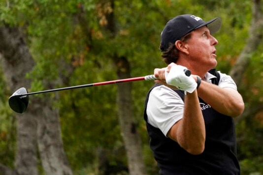 Phil Mickelson hits from the 11th tee during the second round of the Zozo Championship golf tournament Friday, Oct. 23, 2020, in Thousand Oaks, Calif. (AP Photo/Marcio Jose Sanchez)