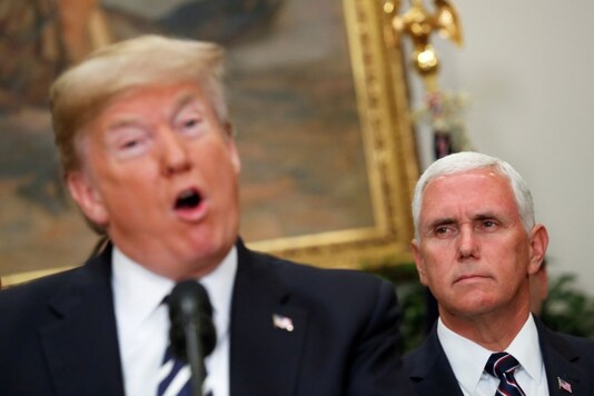 File: U.S. Vice President Mike Pence looks on as U.S. President Donald Trump speaks at White House in Washington, U.S., May 24, 2018. REUTERS/Kevin Lamarque 