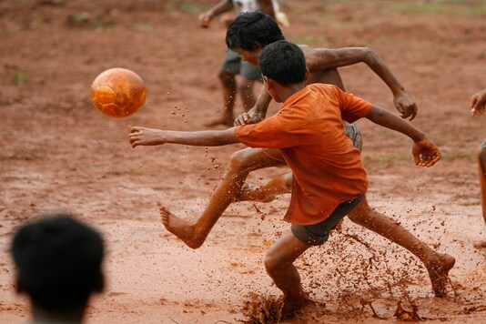 Boys play football in shorts at a village. (Image for representation/REUTERS)