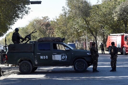 Security personnel stand guard outside of the Kabul University in Kabul on November 2, 2020. (Image: AFP)