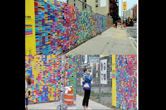 The new art installation called the ‘Wall of Lies’ which looks like a multicoloured post-it notes is the second iteration as the earlier original exhibit was defaced by vandals in Brooklyn. (Credit: Instagram)