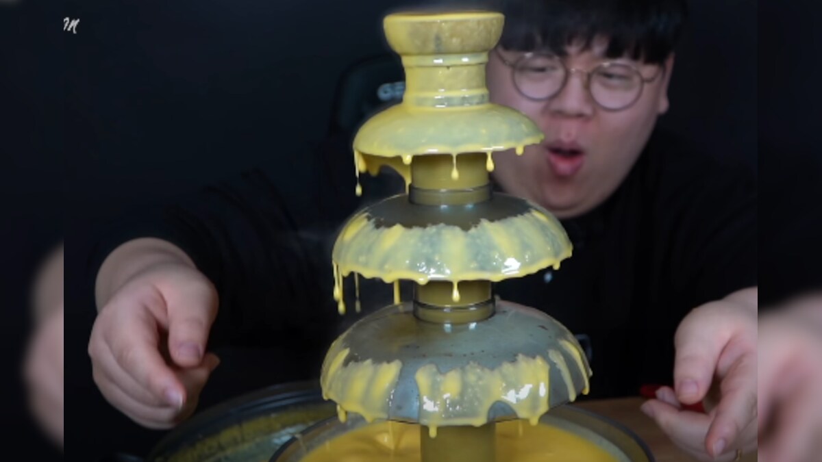 WATCH: Mukbang YouTuber's Priceless Reaction to Makeshift Cheese Fountain Goes Viral