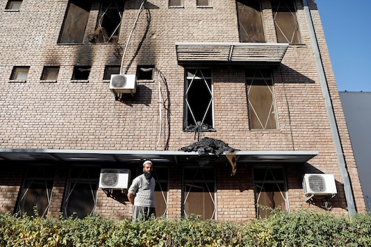 An Afghan man stands outside the university building after yesterday's attack in Kabul, Afghanistan November 3, 2020. REUTERS/Mohammad Ismail
An Afghan man stands outside the university building after yesterday's attack in Kabul, Afghanistan November 3, 2020. REUTERS/Mohammad Ismail