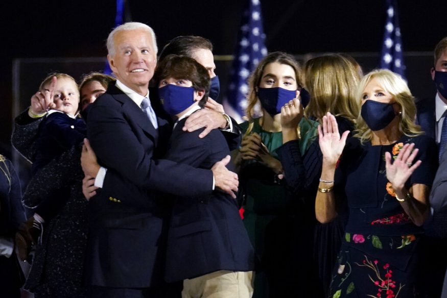  President-elect Joe Biden and Jill Biden stand with their family and watch fireworks after speaking in Wilmington, Delaware. (Image: AP)