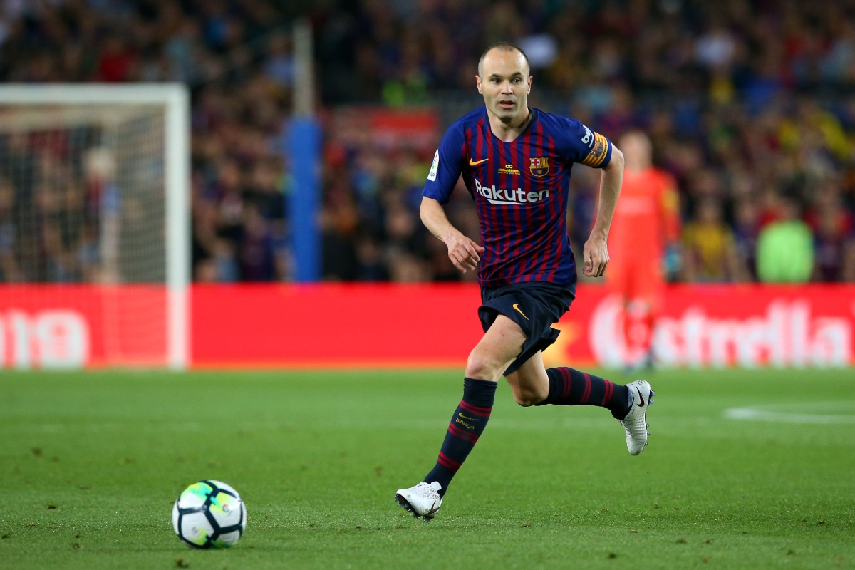 Iniesta out for four months after operation