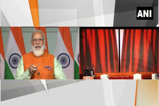PM Narendra Modi unveils the Vivekananda statue via video-conferencing. 