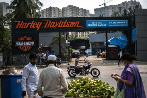 A motorcyclist drives past a Harley-Davidson outlet and workshop in Mumbai, India, on Nov. 2, 2020. (Rebecca Conway/The New York Times)