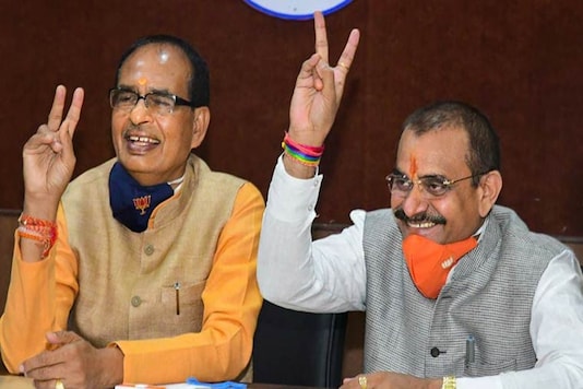 Madhya Pradesh CM Shivraj Singh Chouhan along with state BJP president VD Sharma (PTI)