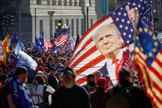 Supporters of US President Donald Trump participate in a 