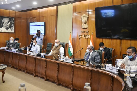 Home Minister Amit Shah chairs a review meeting in New Delhi on Sunday. (PTI)