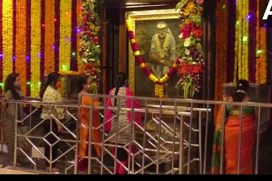 File photo of devotees offering prayers at Shirdi Sai Baba temple.