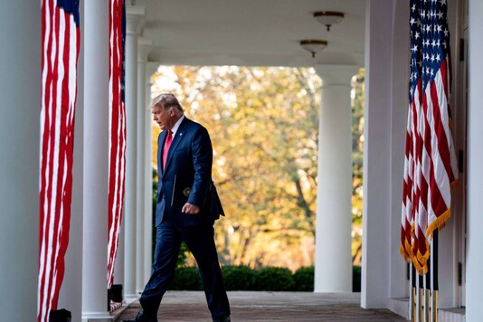 President Donald Trump walks to the Rose Garden of the White House in Washington, Nov. 13, 2020. (Anna Moneymaker/The New York Times) 