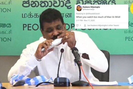 Video grab of former Sri Lanka minister eating a raw fish.
