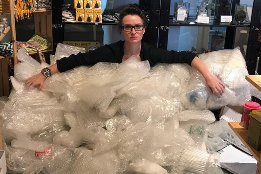Claire Sancelot, the founder of The Hive Bulk Foods, a social enterprise in Malaysia that runs zero waste stores, poses with bubble wrap her firm collected for reuse. (Credit: Claire Sancelot/The Hive Bulk Foods via REUTERS) Claire Sancelot, the founder of The Hive Bulk Foods, a social enterprise in Malaysia that runs zero waste stores, poses with bubble wrap her firm collected for reuse. (Credit: Claire Sancelot/The Hive Bulk Foods via REUTERS)