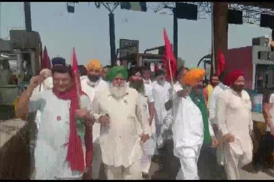 Farmer organisations blocked Ladowal Toll Plaza in Talwandi Kalan of Ludhiana in protest against farm laws on October 9, 2020. (ANI)