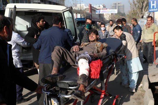 An injured man is carried to a hospital after rockets hit residential areas in Kabul, Afghanistan November 21, 2020. REUTERS/Omar Sobhani An injured man is carried to a hospital after rockets hit residential areas in Kabul, Afghanistan November 21, 2020. REUTERS/Omar Sobhani