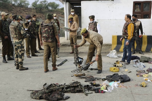 Security personnel inspect the site of encounter at Nagrota Ban toll plaza in Jammu, on November 19, 2020. (PTI) Security personnel inspect the site of encounter at Nagrota Ban toll plaza in Jammu, on November 19, 2020. (PTI)