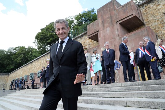 Former French President Nicolas Sarkozy leaves, following the traditional annual ceremony at the Mont-Valerien, a memorial for the French who fought against the Nazis and those who were killed by the occupying forces, in Suresnes, west of Paris, France June 18, 2020. Ludovic Marin/Pool via REUTERS