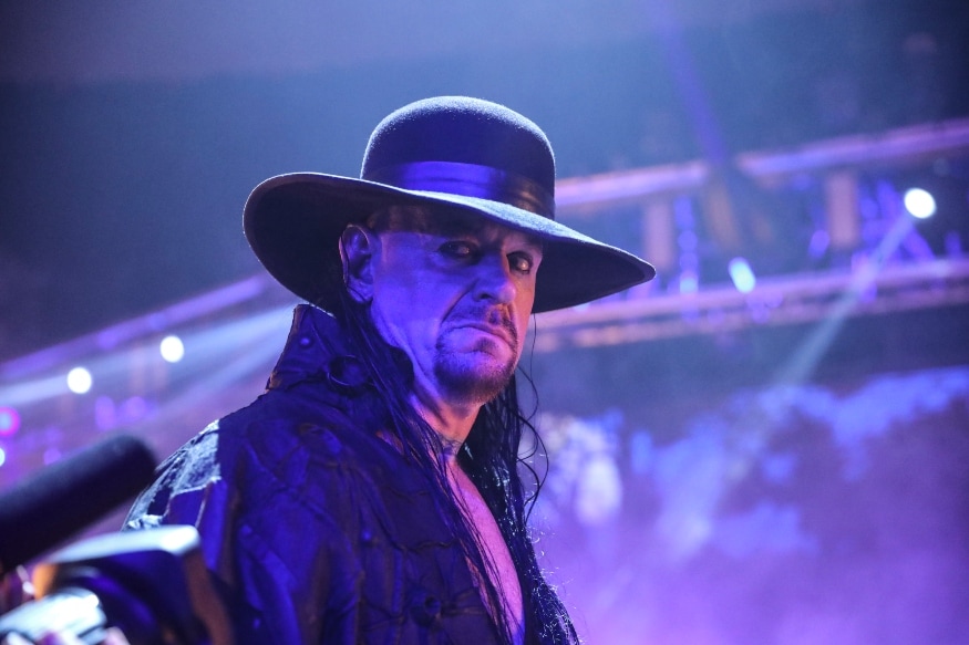 The Undertaker Bids Goodbye to WWE: Stunning Images from the Farewell