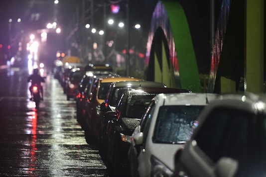 Chennai: Residents park their vehicles on a flyover before the landfall of Cyclone Nivar, at Velachery in Chennai, Wednesday, Nov. 25. (PTI Photo)