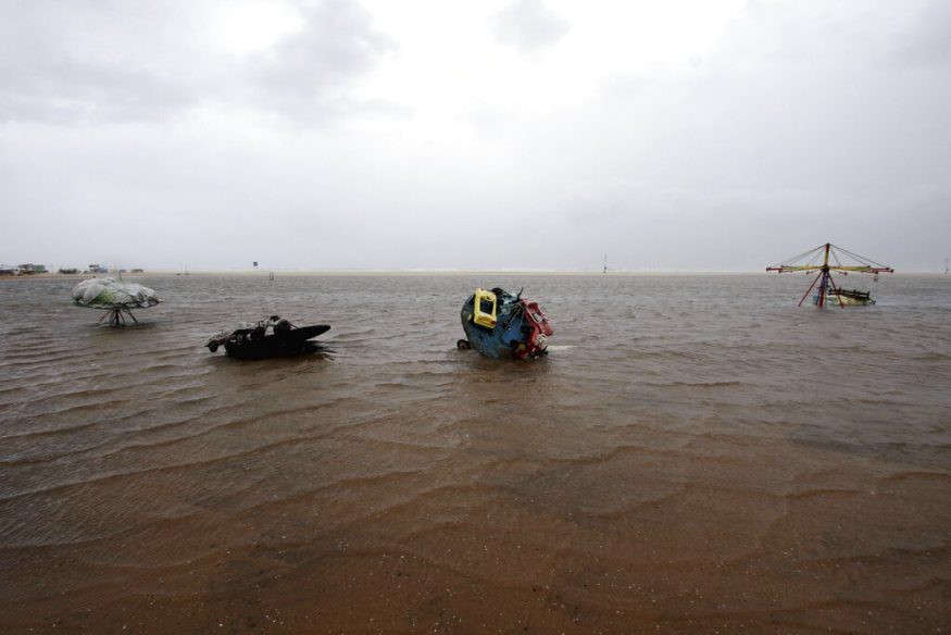  Children's joy rides are partially submerged in water at the Marina Beach on the Bay of Bengal coast in Chennai. (Image: AP)