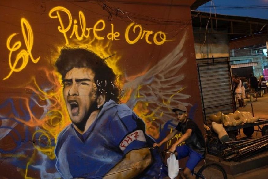 In Photos As Fans Mourn Diego Maradona's Death, He Lives on in the