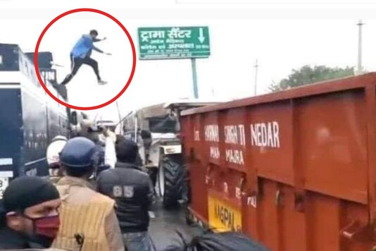 Viral Photo of Young Protestor Jumping Onto Water Canon to Turn It Off at Farmers Protest Becomes the Symbol of Resistance 