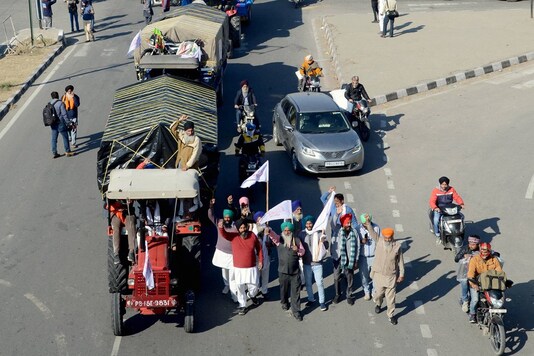 Farmers head towards Delhi during the 'Delhi Chalo' protest march against the new farm laws, on the outskirts of Amritsar, Friday, Nov. 27, 2020. (PTI Photo)