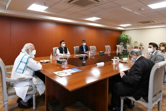 PM Narendra Modi chairs a meeting during his visit to Serum Institute of India in Pune. (AFP)
