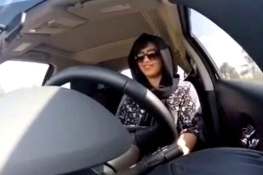 This Nov. 30, 2014 image made from video released by Loujain al-Hathloul, shows her driving towards the United Arab Emirates - Saudi Arabia border before her arrest on Dec. 1, 2014, in Saudi Arabia. (AP)