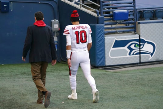 San Francisco 49ers quarterback Jimmy Garoppolo (10) walks to the locker room during the second half of an NFL football game against the Seattle Seahawks, Sunday, Nov. 1, 2020, in Seattle. (AP Photo/Scott Eklund) San Francisco 49ers quarterback Jimmy Garoppolo (10) walks to the locker room during the second half of an NFL football game against the Seattle Seahawks, Sunday, Nov. 1, 2020, in Seattle. (AP Photo/Scott Eklund)