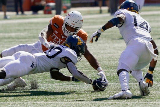 No. 22 Texas' Defense Holds Off West Virginia, 17-13 No. 22 Texas' Defense Holds Off West Virginia, 17-13