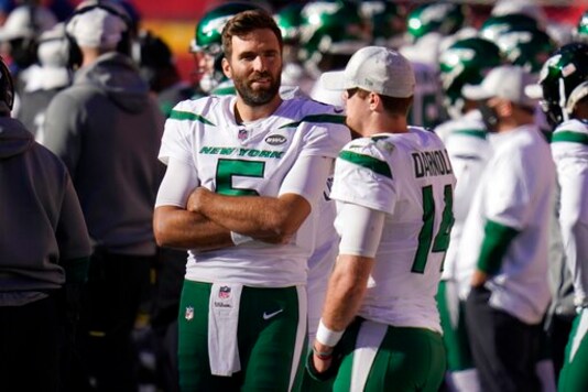 New York Jets' Joe Flacco (5) and Sam Darnold (14) talk on the sideline late in the second half of an NFL football game against the Kansas City Chiefs on Sunday, Nov. 1, 2020, in Kansas City, Mo. (AP Photo/Jeff Roberson)