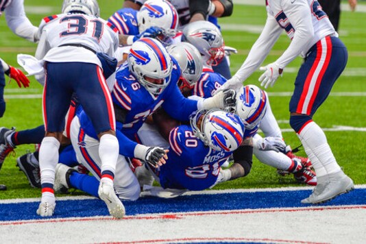 Buffalo Bills running back Zack Moss (20) rushes for a touchdown during the second half of an NFL football game against the New England Patriots Sunday, Nov. 1, 2020, in Orchard Park, N.Y. (AP Photo/Adrian Kraus)