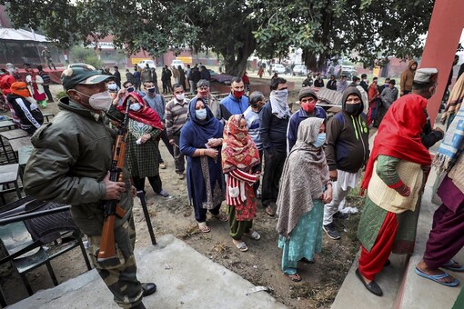 Voters wait in queues to cast their votes during the District Development Council (DDC) elections. (PTI/File Photo)