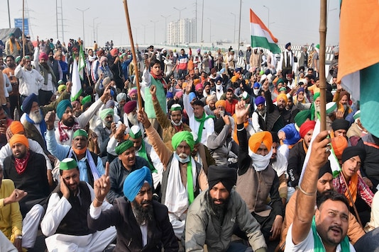 Farmers raise slogans during their 'Delhi Chalo' protest march against the new farm law, at Ghazipur in New Delhi on Thursday, December 3, 2020.  (PTI Photo)