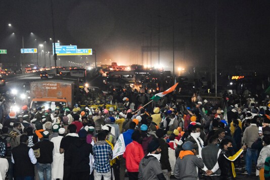 Farmers block a part of the Delhi-Meerut highway during their protest against the new farm laws, on December 3, 2020. (PTI Photo)