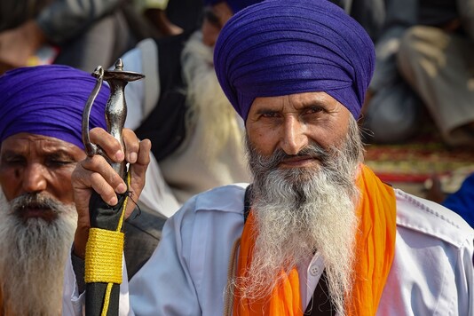 New Delhi: A Nihang at Singhu border during farmers' 'Delhi Chalo' protest march against the Centre's new farm laws, in New Delhi. (PTI)