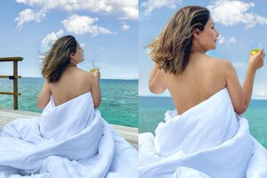 Hina Khan Covers-up with a Duvet in New Pictures from Maldives