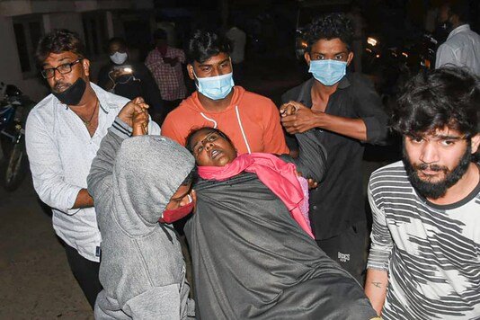 A woman showing symptoms of epilepsy being taken to a hospital in Eluru town of West Godavari district on December 6. (File photo/PTI)