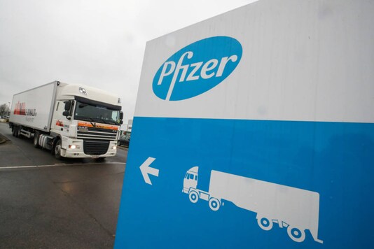 A refrigerated truck leaves the Pfizer plant in Puurs, Belgium on December 3, 2020. (REUTERS/Yves Herman)