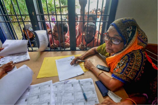 File photo of people gathered at an NRC Nagarik Seva Kendra in Guwahati. (PTI photo)
