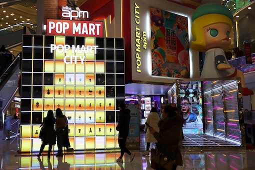A booth of Chinese toy maker Pop Mart is seen at a shopping mall in Beijing. 

REUTERS/Tingshu Wang