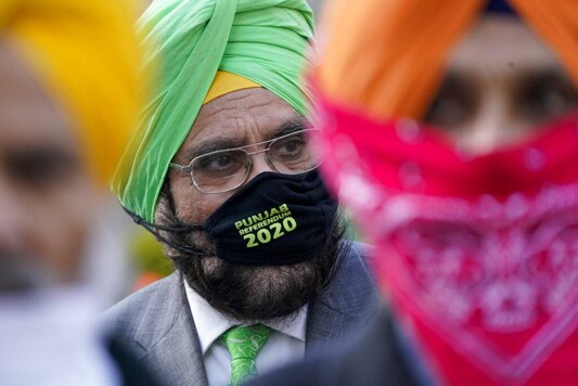 Protesters demonstrate near the Indian Consulate, Thursday, Dec. 10, 2020 in New York, during a rally to highlight India's violence against farmers. The demonstrations held in New York, Chicago, and San Francisco were held by 