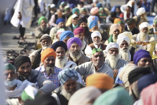 Farmers block Delhi-UP border during their protest against the new farm laws, at NH-24 in Ghazipur on December 13. (File photo/PTI)